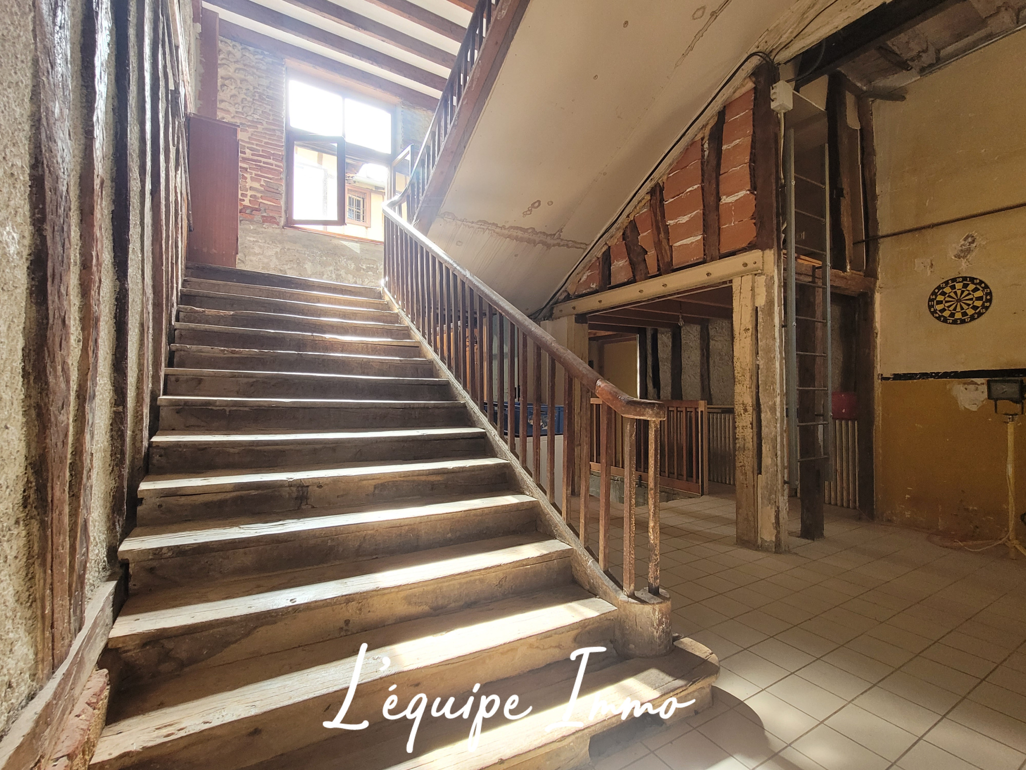 Maison de ville type T4 avec atelier et cave